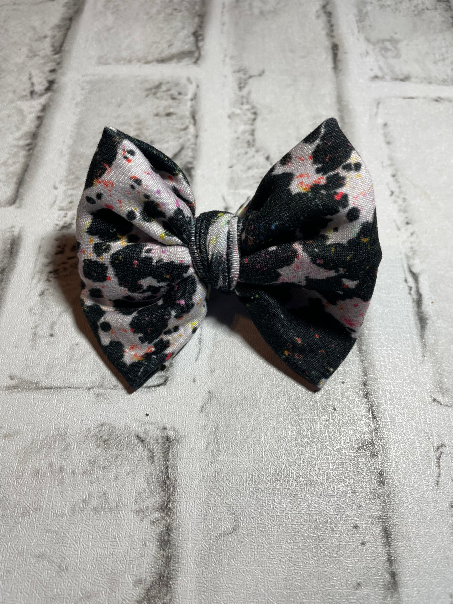 Cow paint splatter clip bow