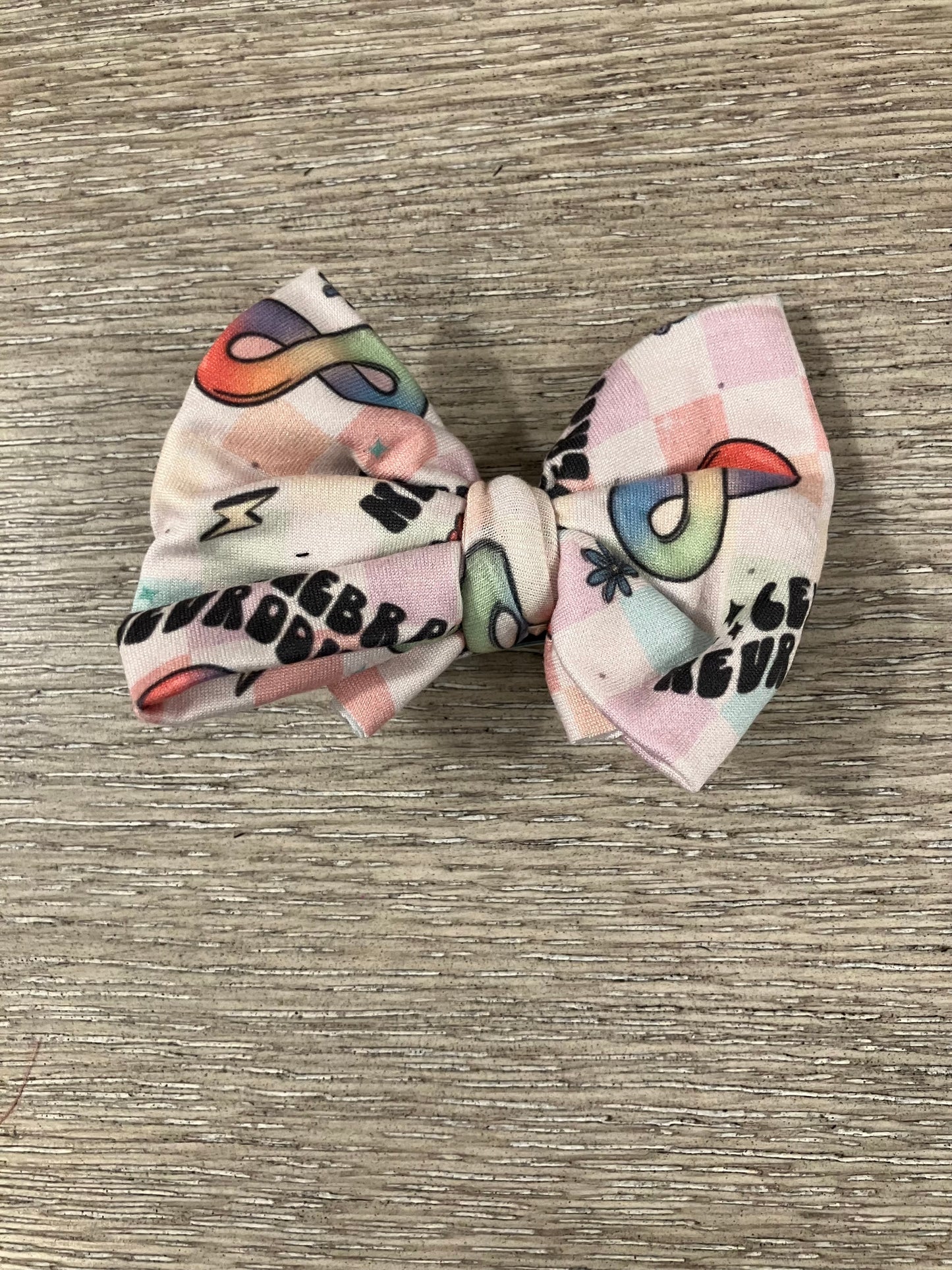 Celebrate neurodiversity clip bows