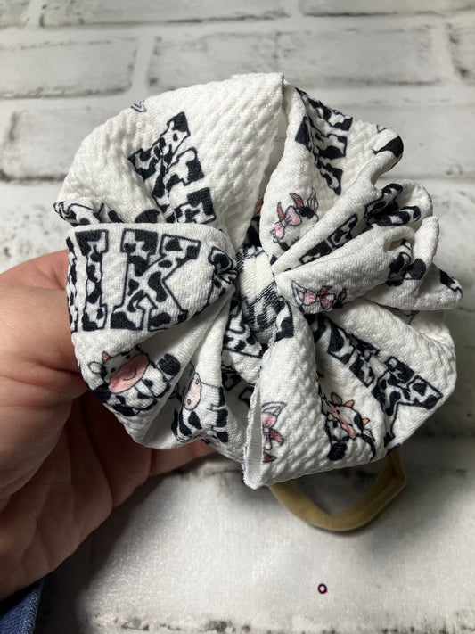 Swoosh cow nylon bow