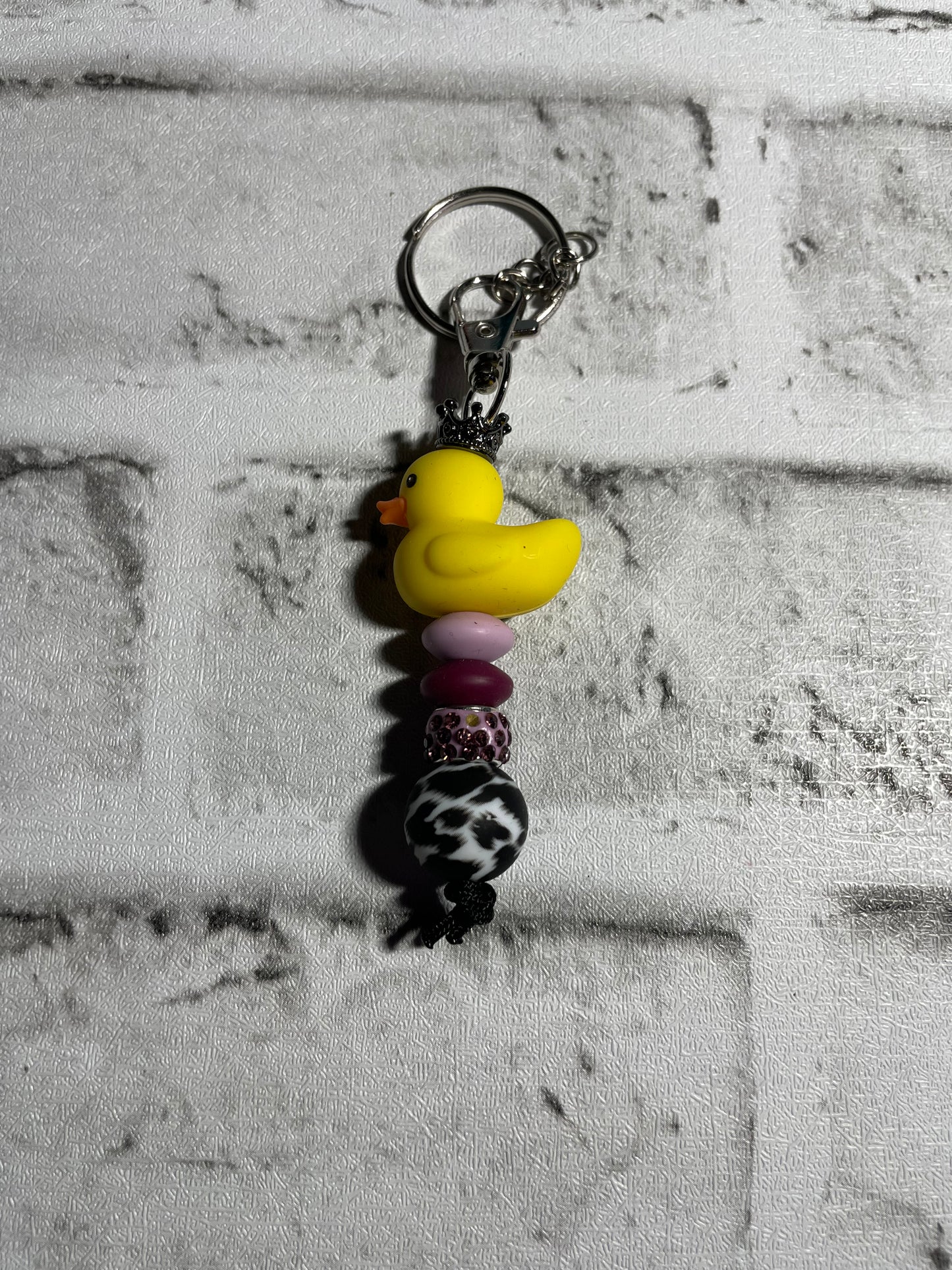 Duck purple cheetah keychain🩵