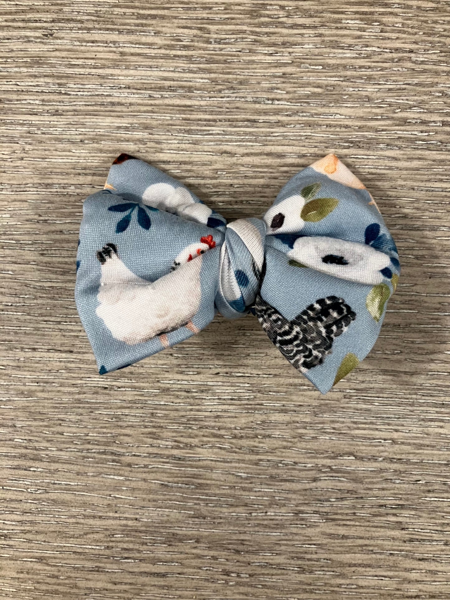 Blue chicken clip bow
