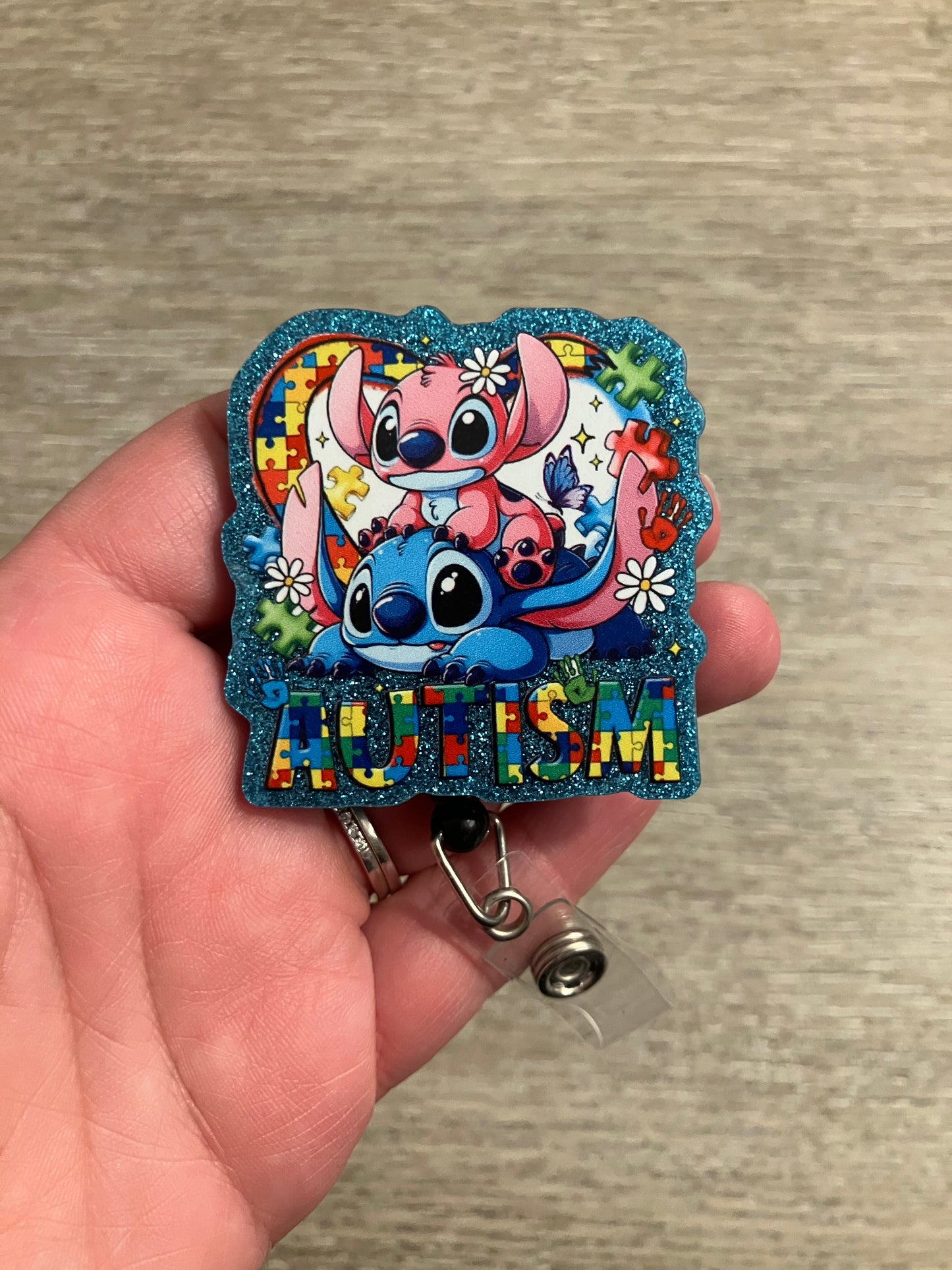 626 autism badge reel