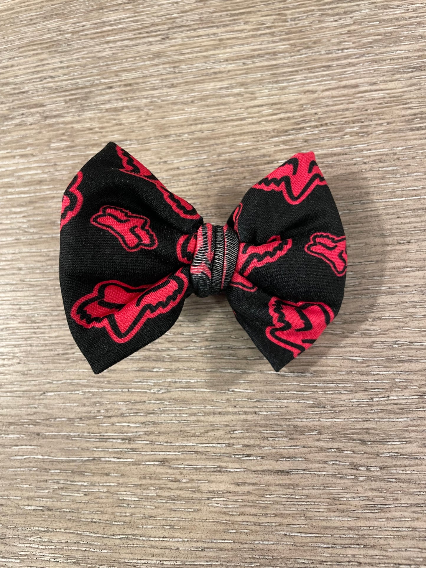 Pink racing clip bow