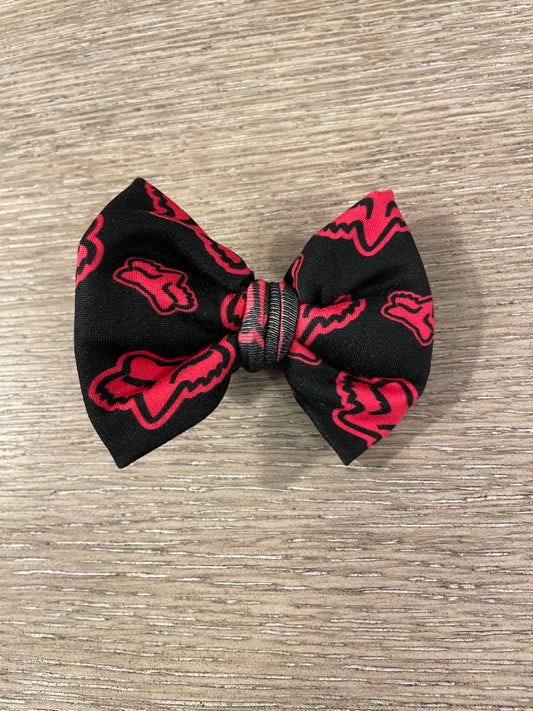 Pink racing clip bow