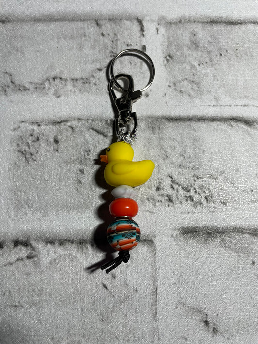 Duck orange turquoise serape keychain🩵