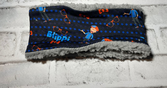 Guy with orange & blue hat no twist ear warmer child💜