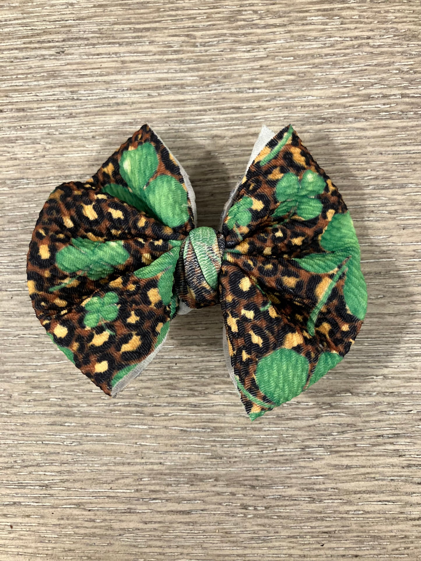 Cheetah clovers clip bows