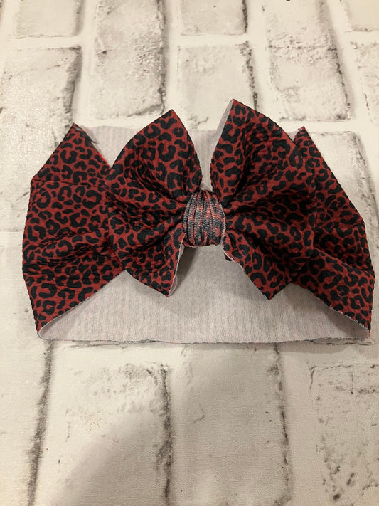 Dark leopard toddler bow