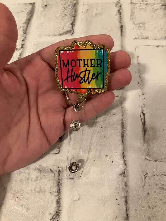 Mother hustler badge reel