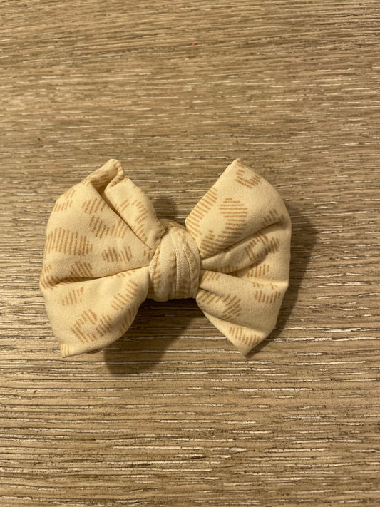 Beige leopard clip bows