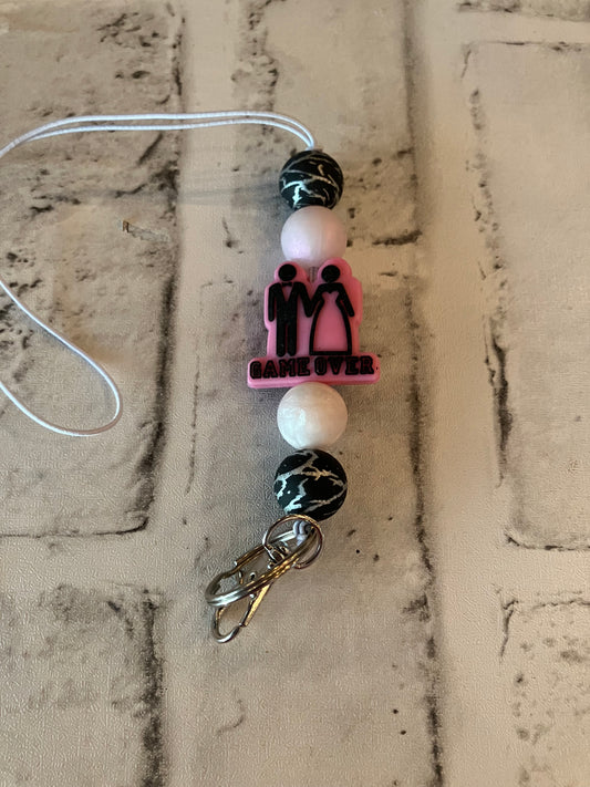 Game over car charm