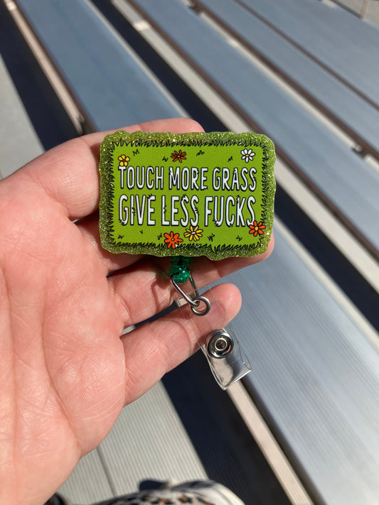Touch more grass and give less fucks badge reel