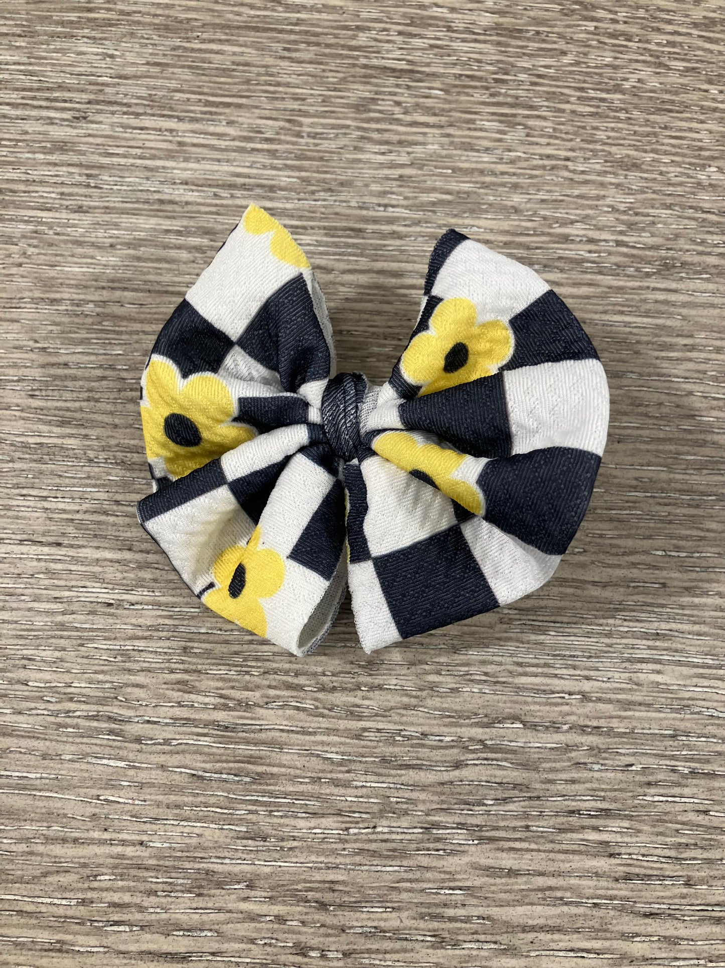 Yellow flower checkered clip bow