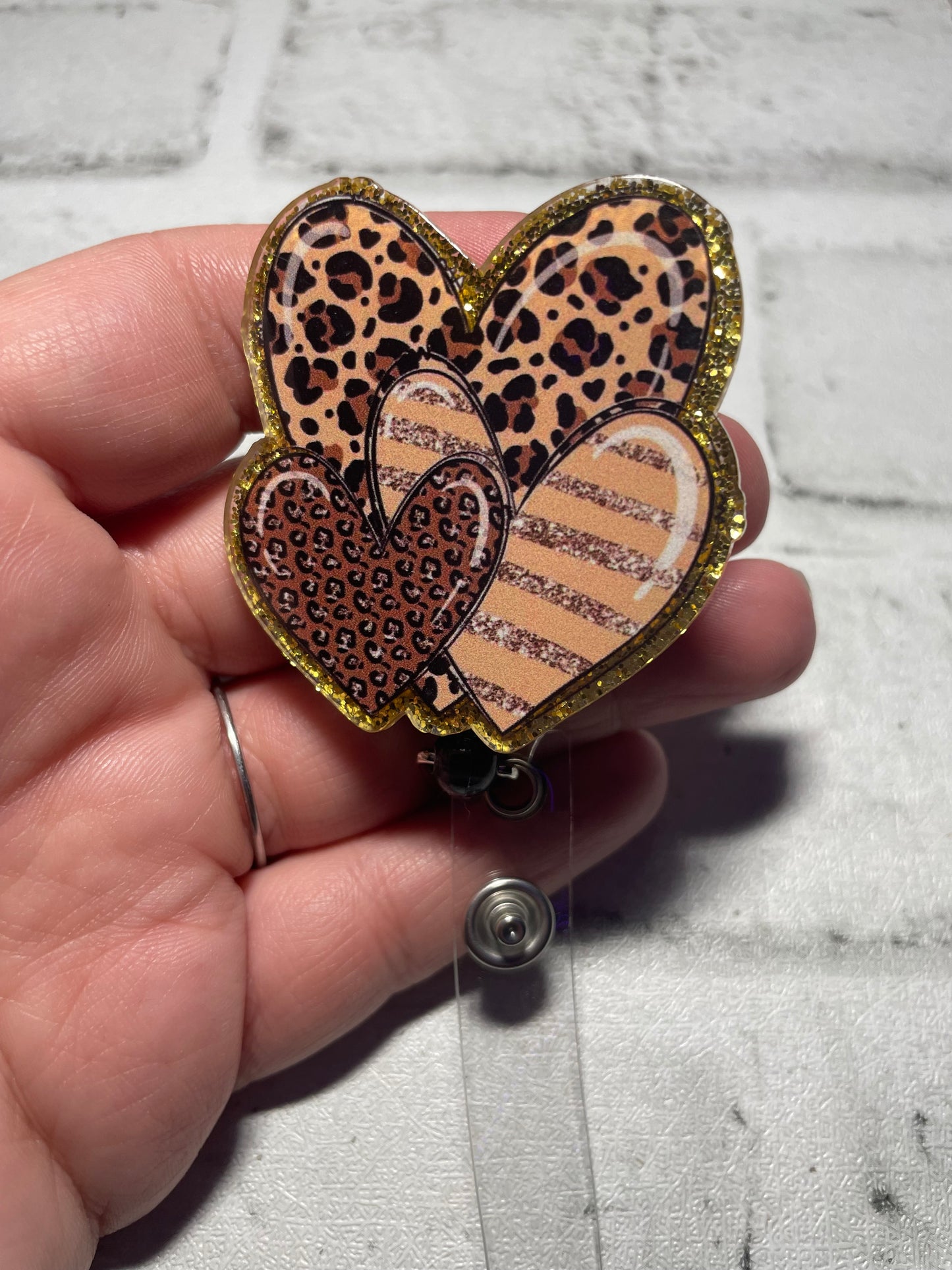 Cheetah hearts badge reels