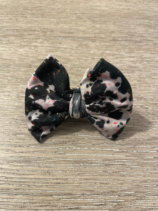 Cow paint splatter clip bow