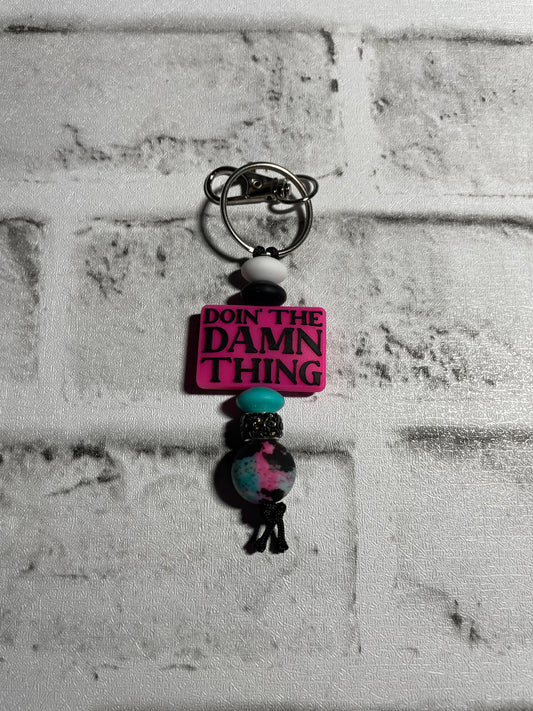 Doin’ the damn thing keychain🩵