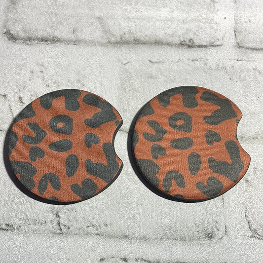 Dark cheetah car coasters