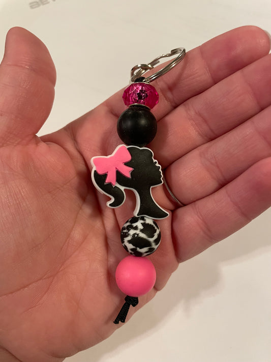 Pink doll keychain