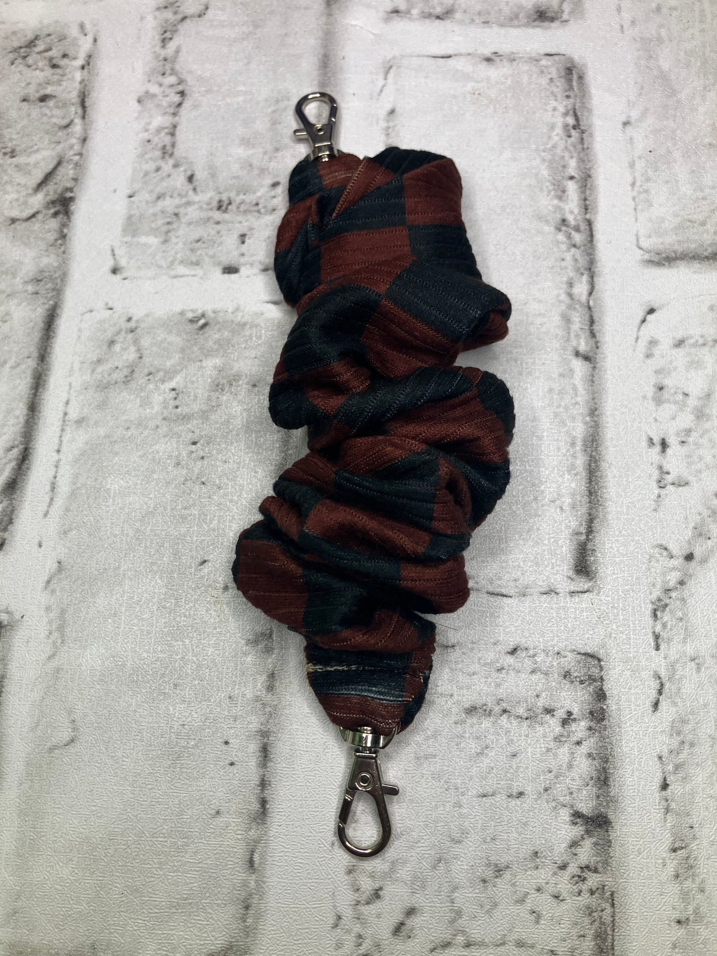 Black checkered scrunchie phone holder