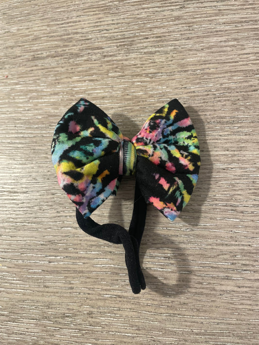 Reverse tie dye nylon bow