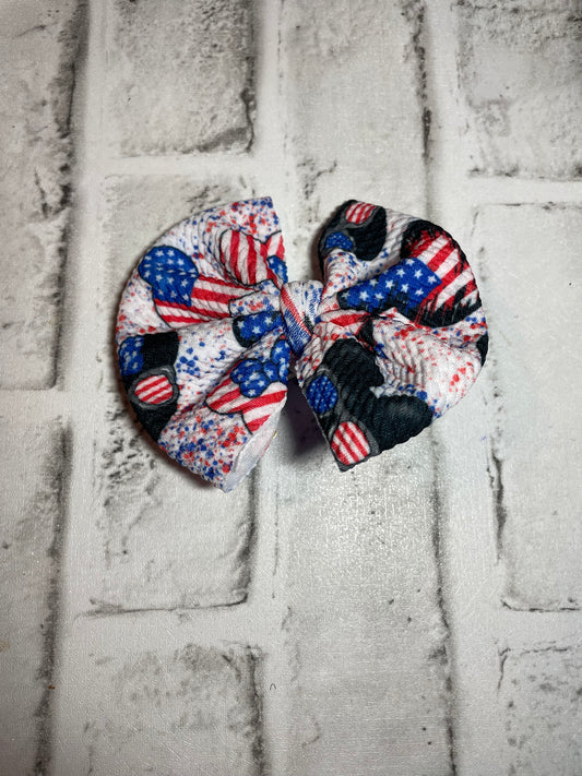 Mouse stripes and stars clip bow