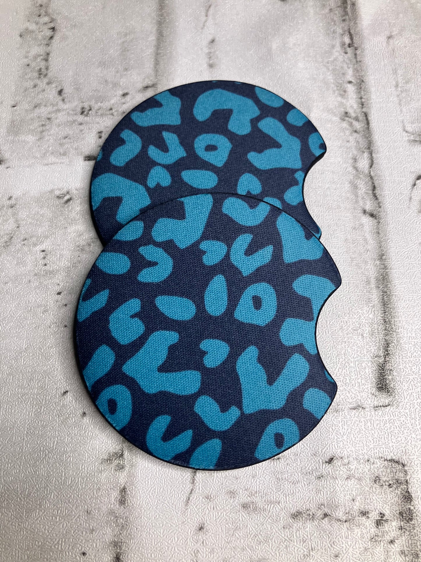 Turquoise leopard car coasters