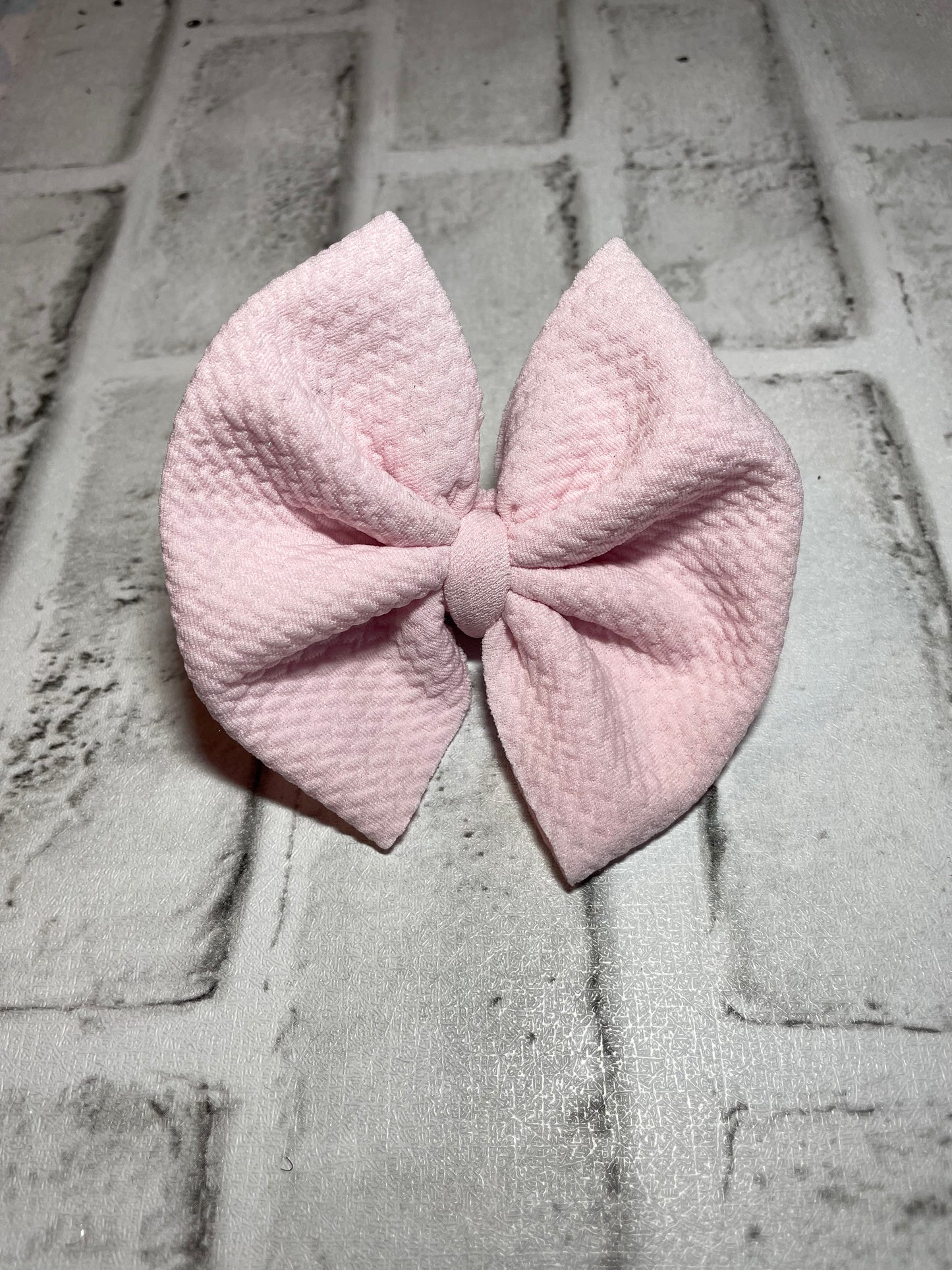 Light pink clip bow