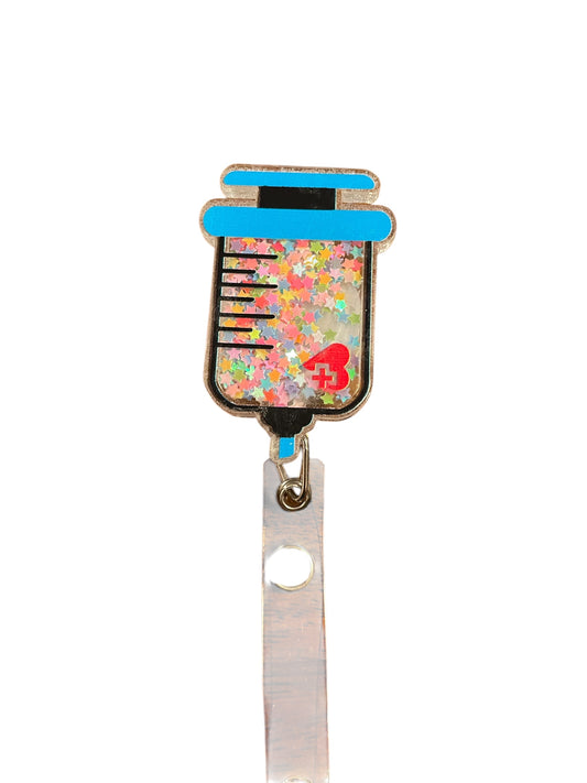 Syringe glitter badge reel