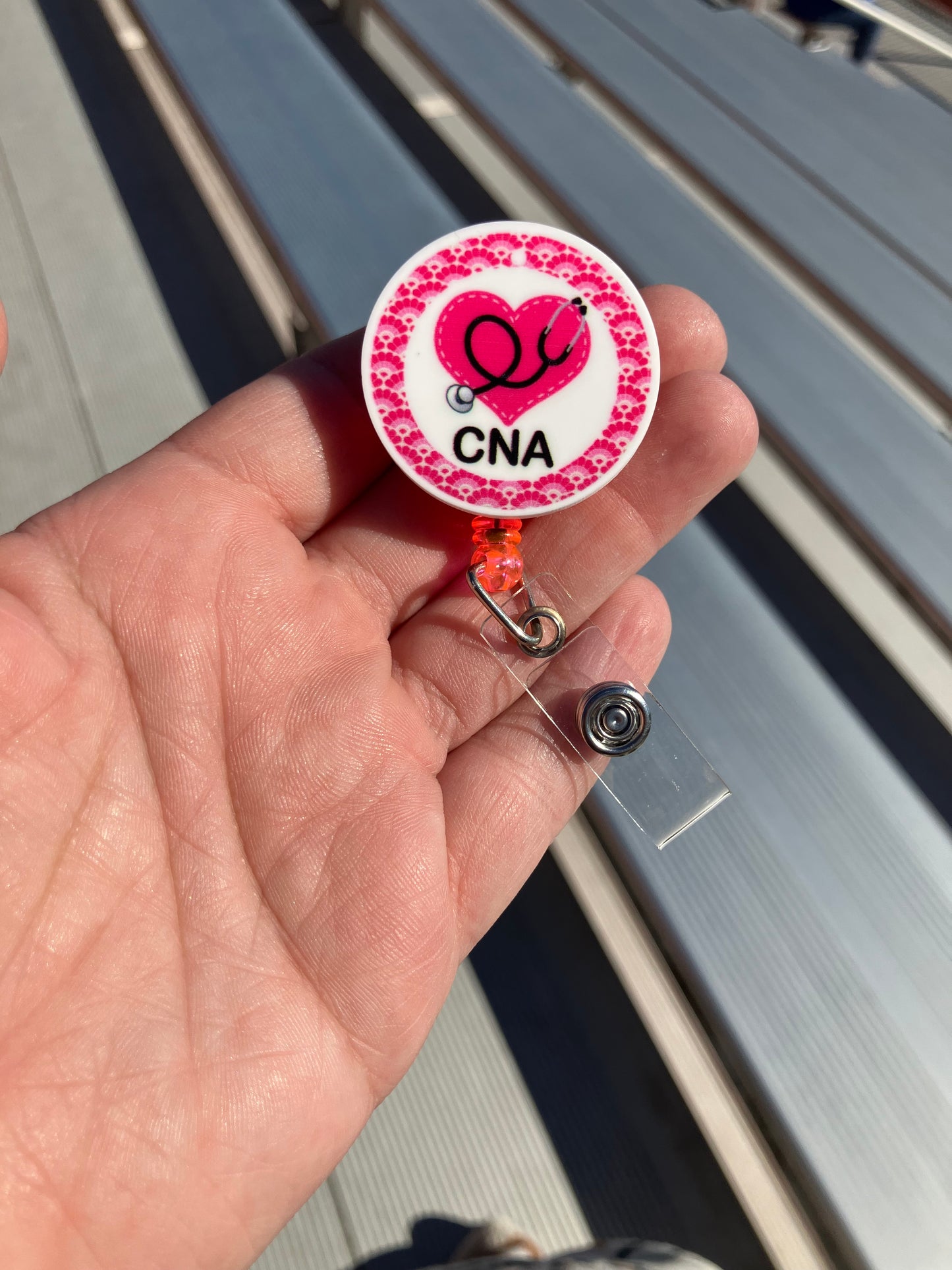 CNA heart badge reel