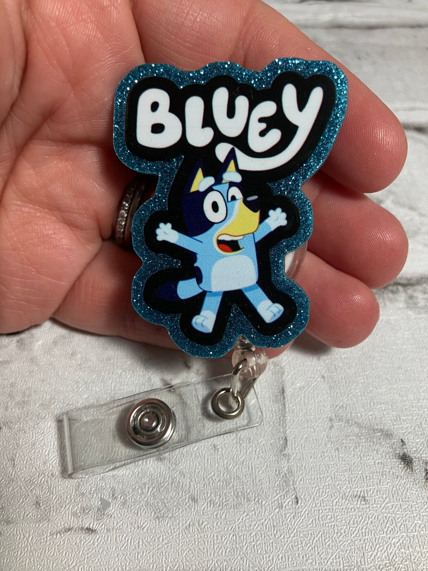 Blue dogg badge reel