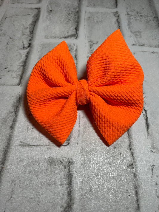 Neon orange clip bows