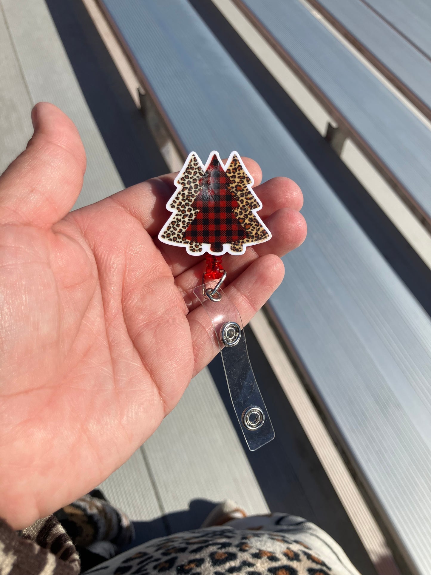 Plaid cheetah trees badge reels
