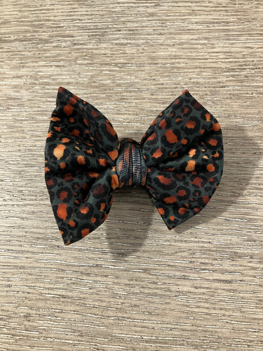 Deep teal leopard clip bow