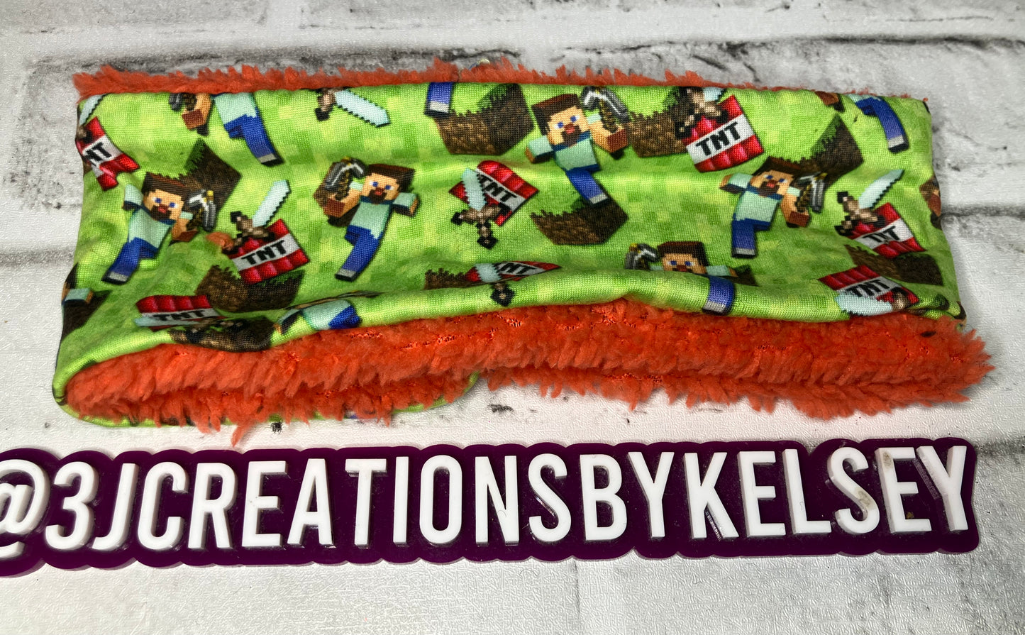 Minecraft orange child ear warmers🪩