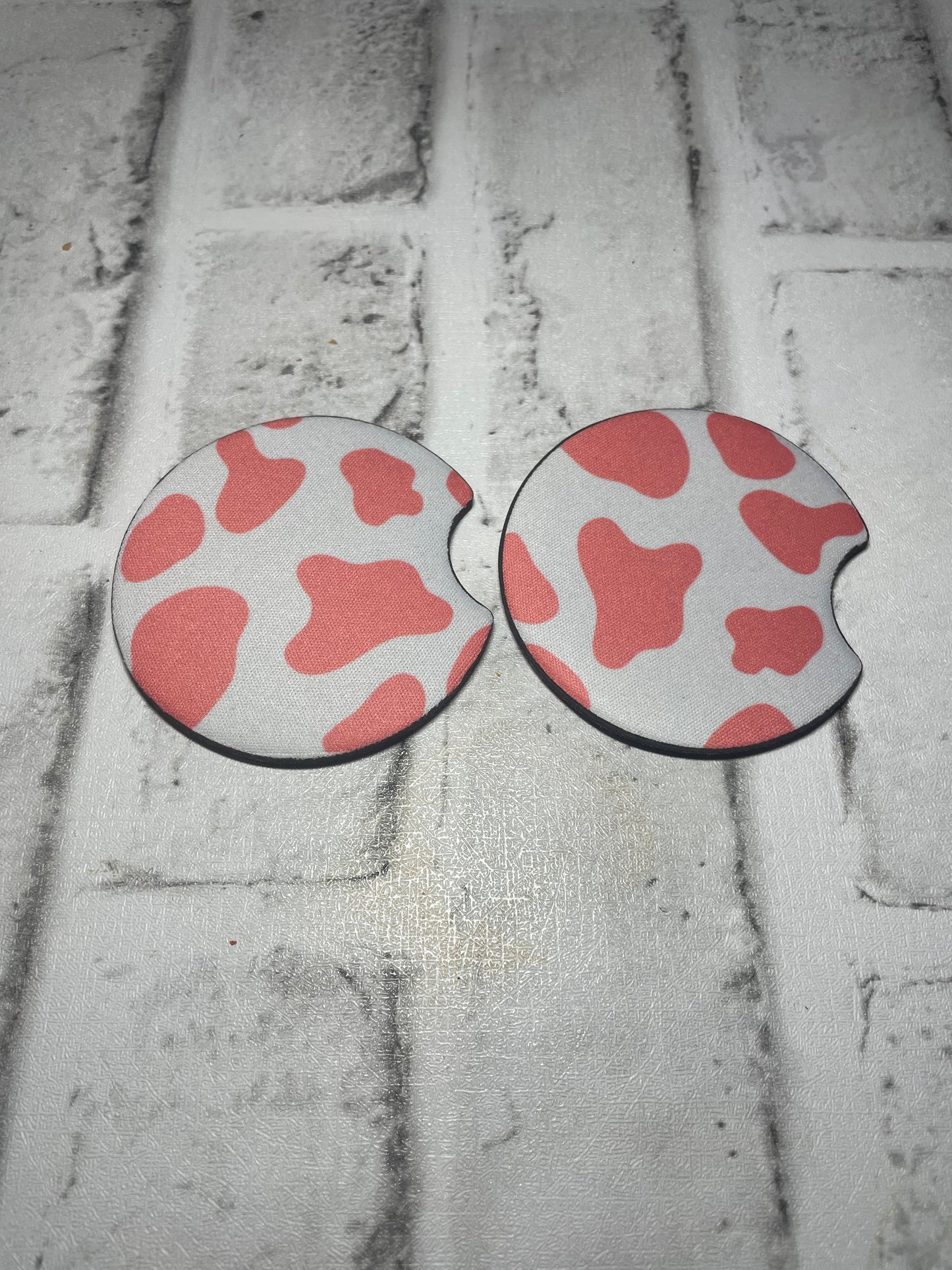 Pink cow car coasters