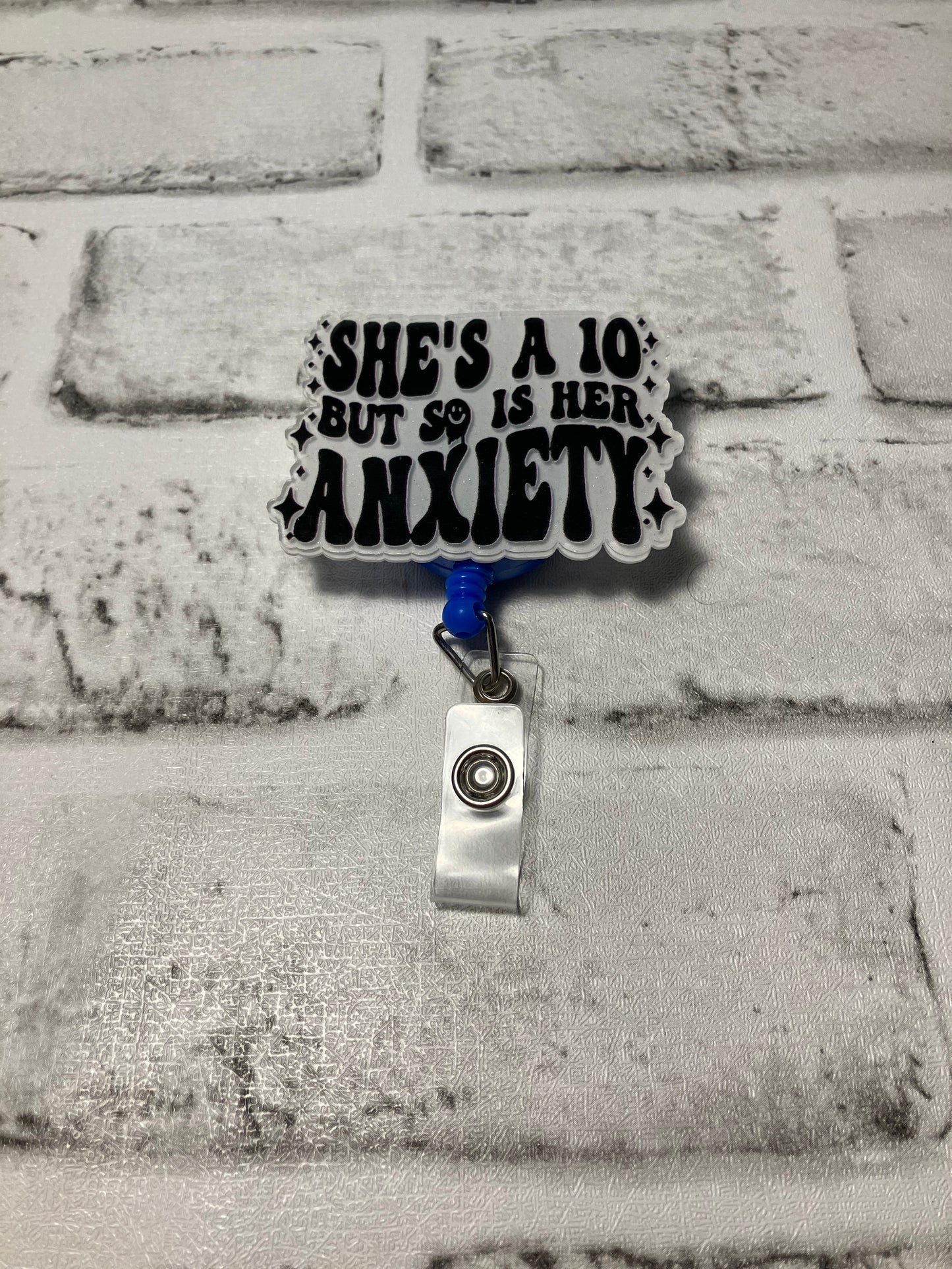 She’s a ten but so is her anxiety badge reels