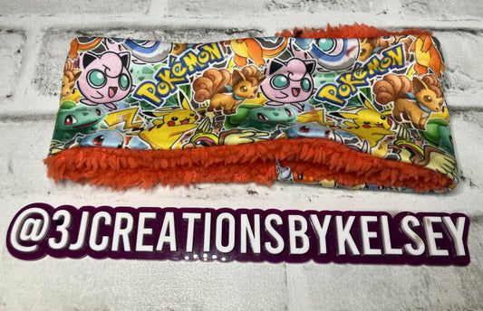 Gotta catch them all orange child ear warmer🪩