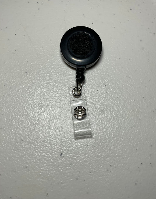 Black badge reel base