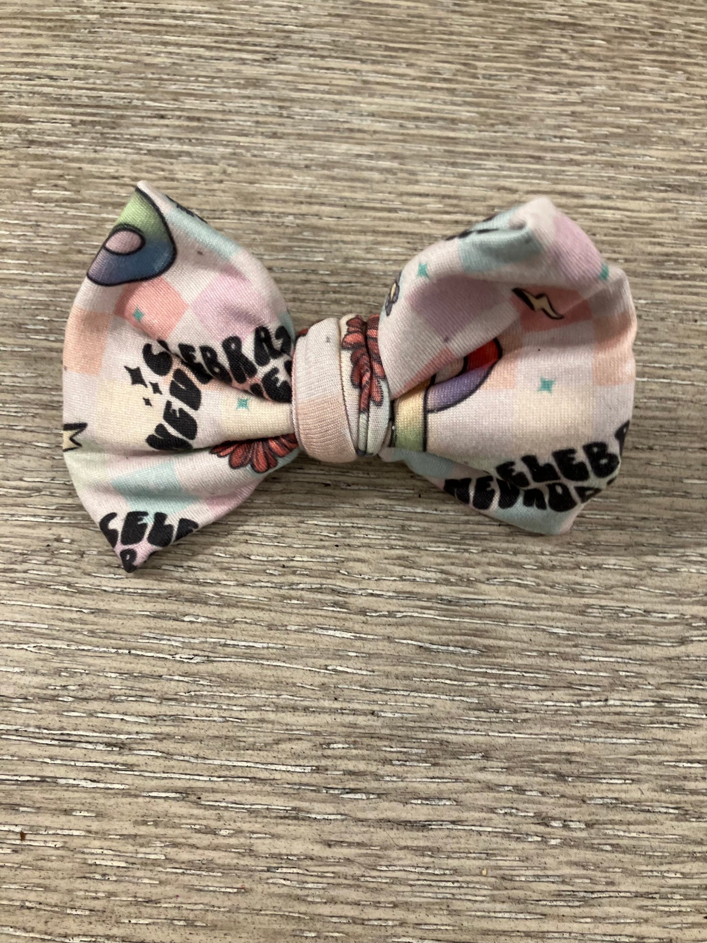 Celebrate neurodivergent clip bow