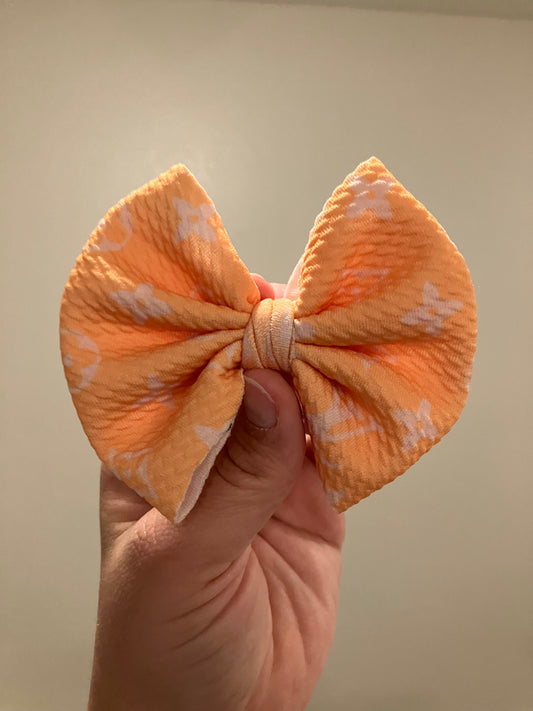 Yellow high end clip bow