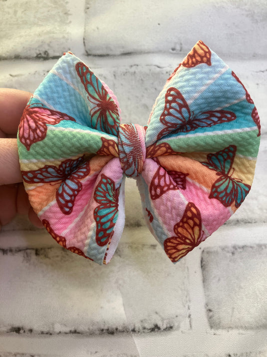 Butterfly rainbow clip bow