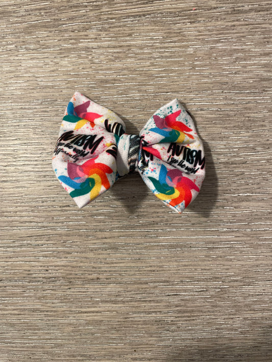 Autism I see the world differently clip bow🧡