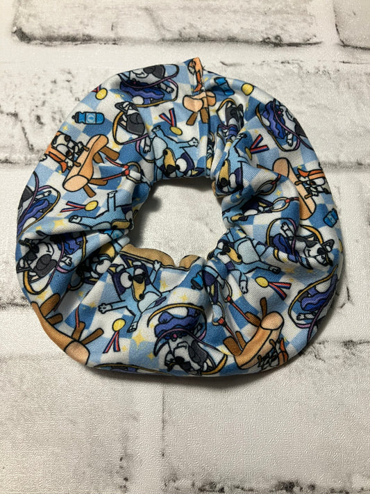 Blue dog gymnastics scrunchies