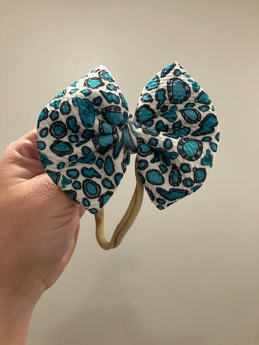 Turquoise cow nylon bow