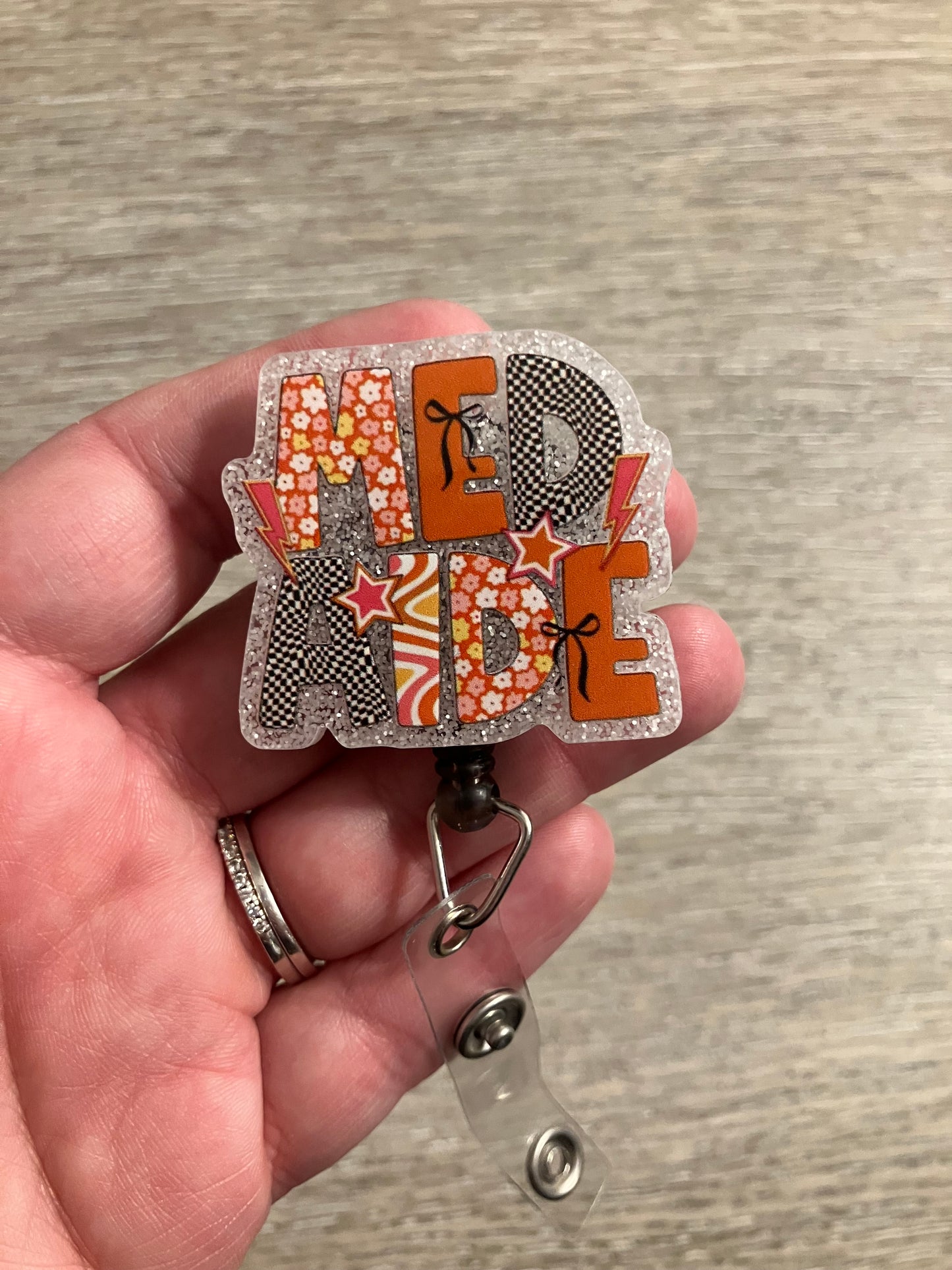 Med aide badge reel