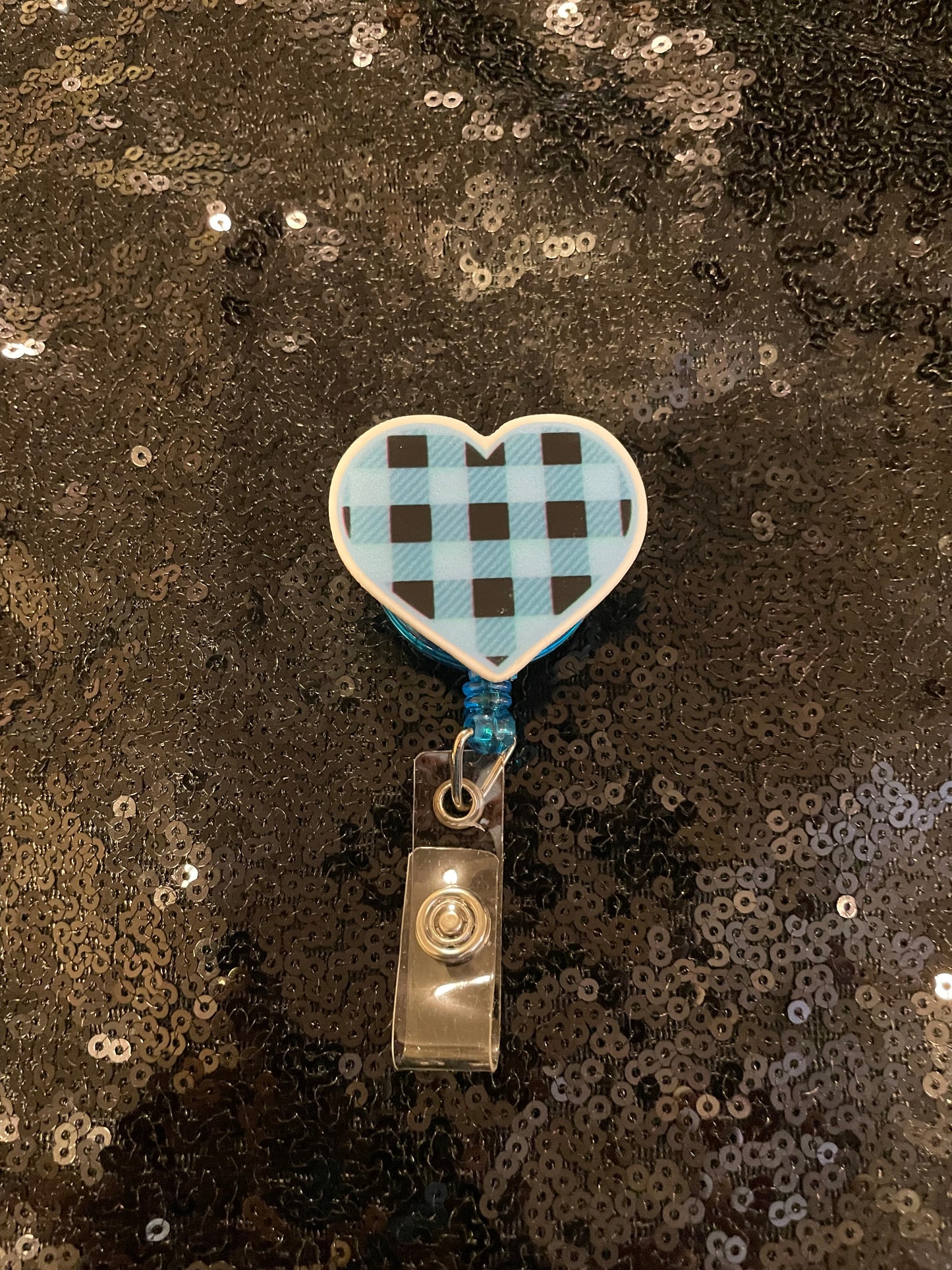 Blue heart badge reels