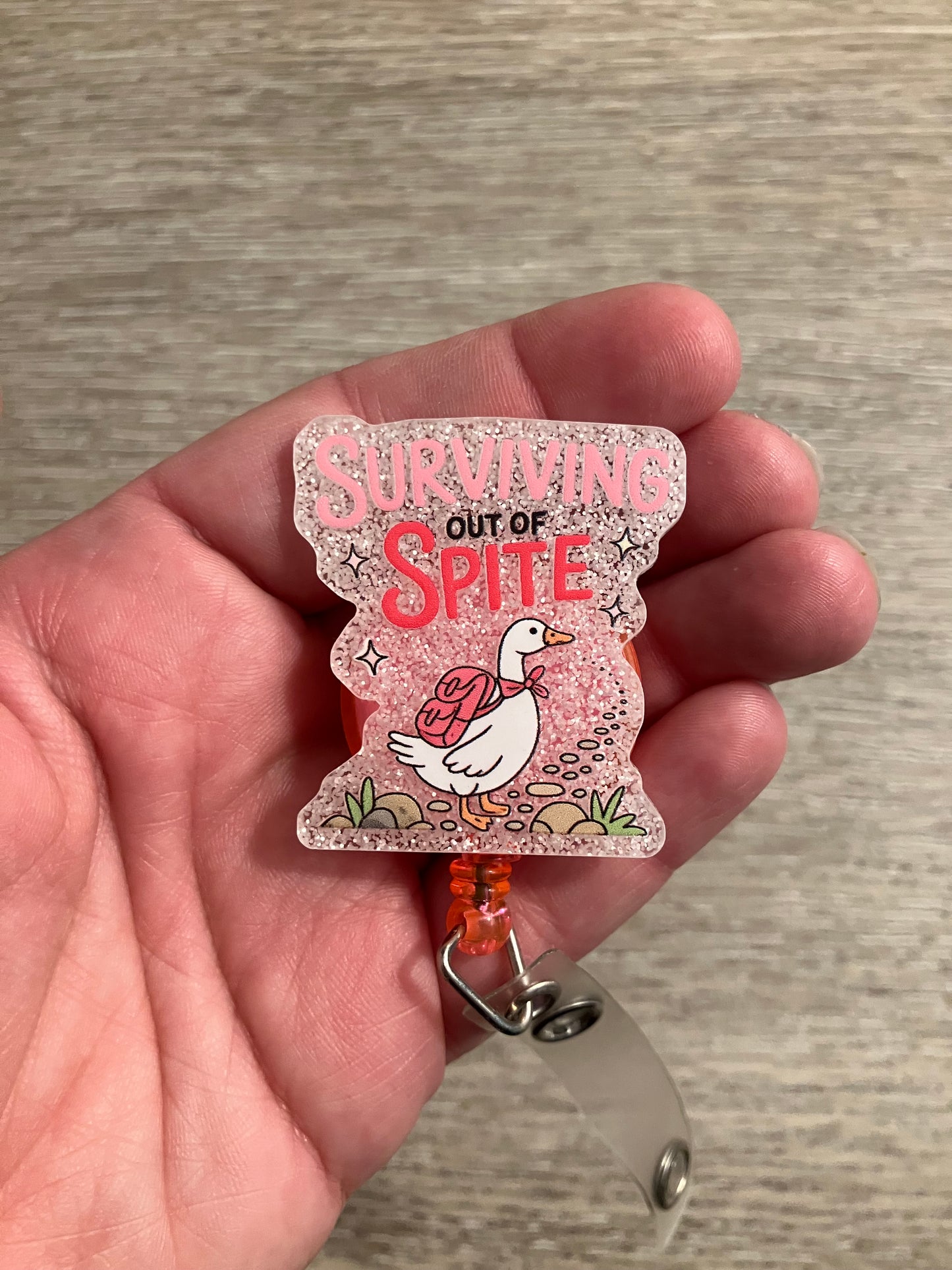 Surviving out of spite badge reels