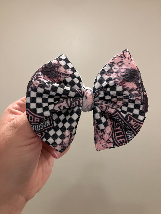 Pink motorcycle clip bows