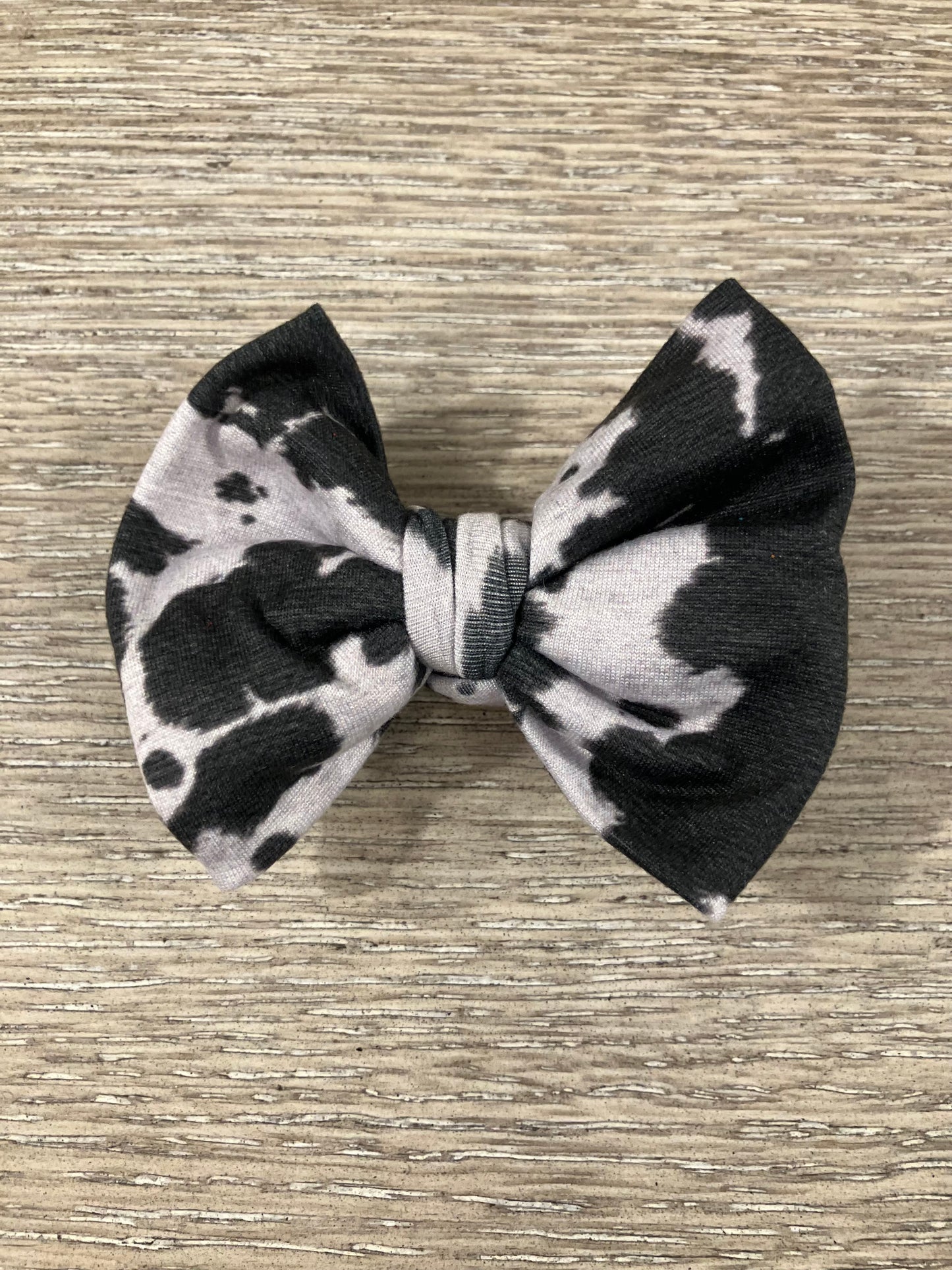 Black cow clip bow