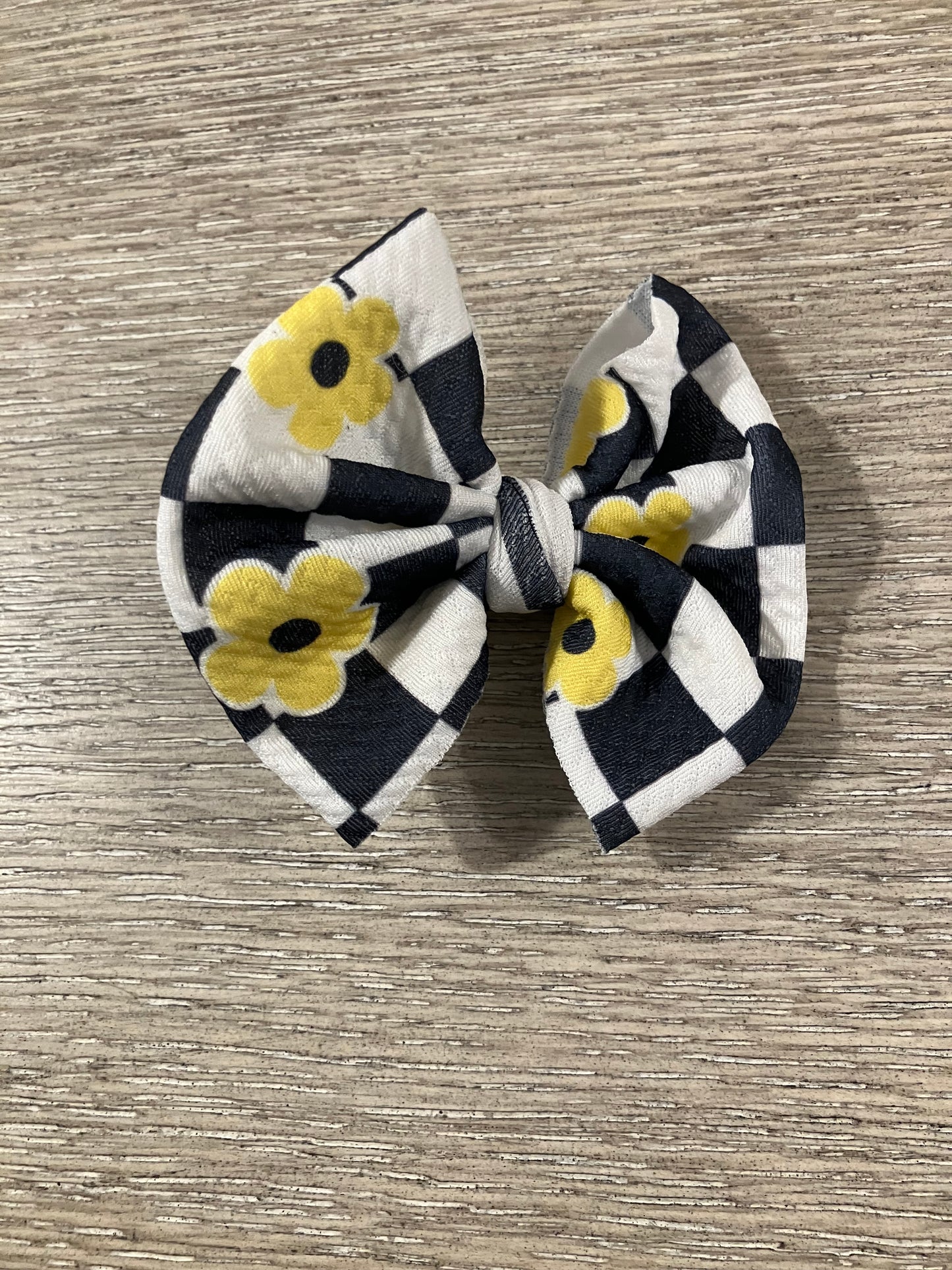 Black checkered with yellow flowers clip bow